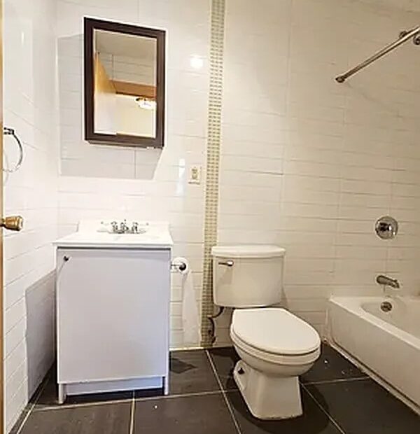 Spacious 4BR Ridgewood Apartment w/ Laundry, Roof Access & No Broker Fee!